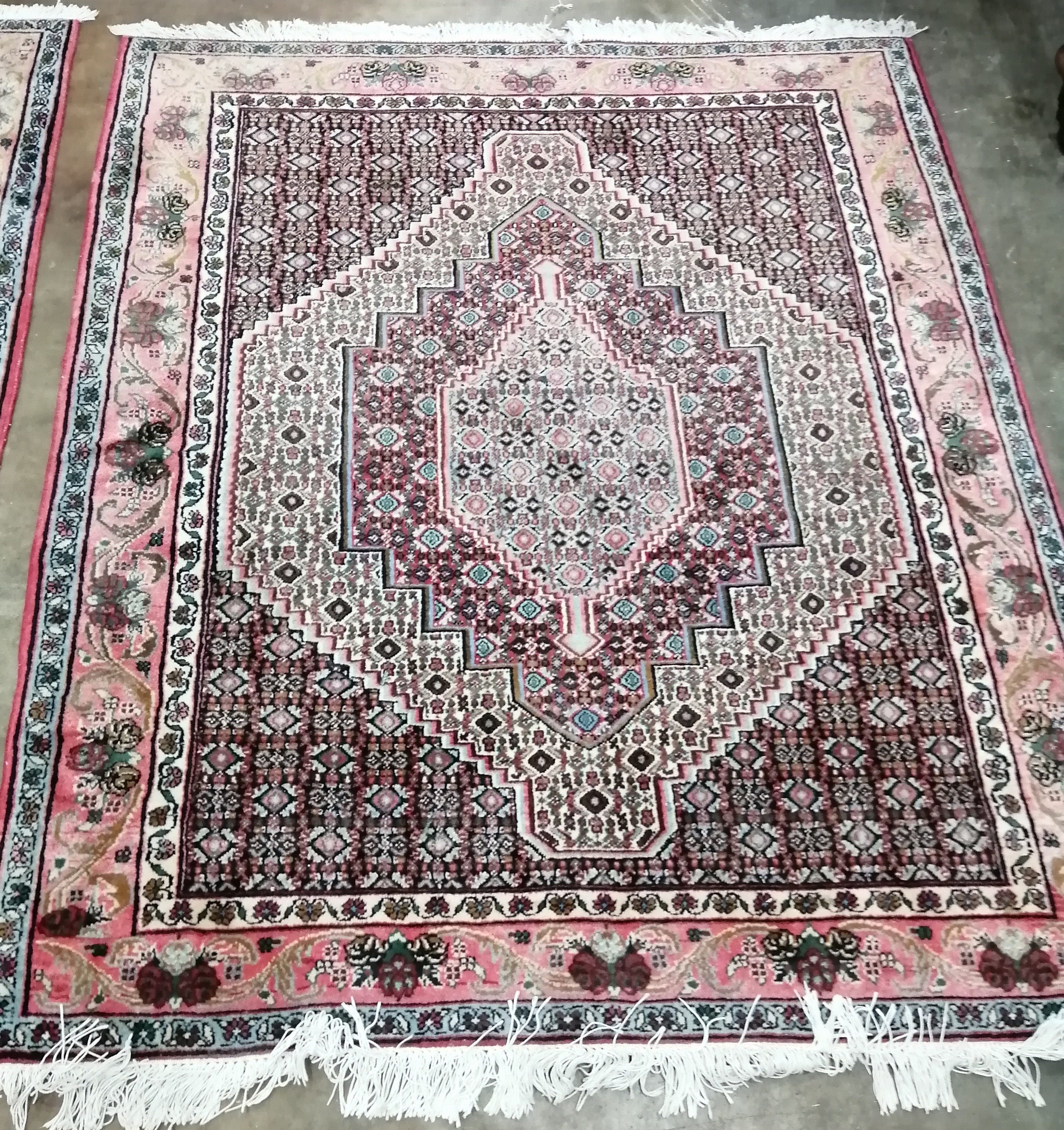 A Senneh blue ground rug, 150 x 120cm